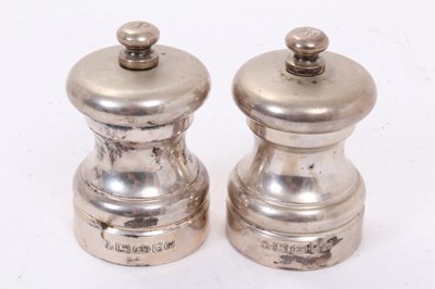 Lot 359 - Pair of contemporary silver salt mills (London 2007), maker M C Hersey & Son Ltd, each 7.5cm in height