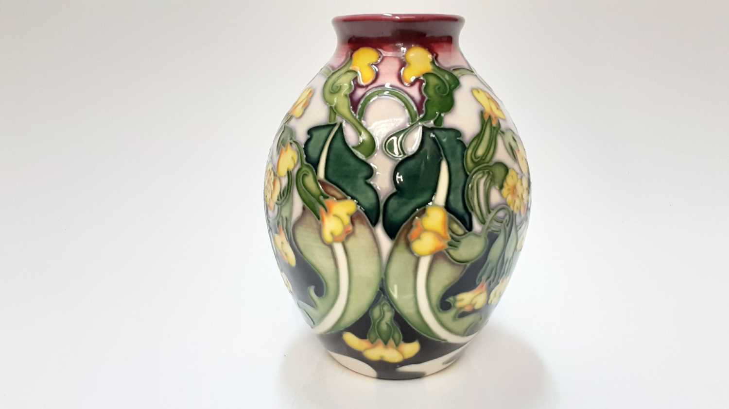Lot 1113 - Moorcroft pottery limited edition vase decorated in the Paigles pattern for Thaxted Church by Emma Bossons, no. 15 of 200, dated 2006