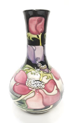Lot 1118 - Moorcroft pottery vase with floral decoration by Emma Bossons, dated 2007, 23.5cm high