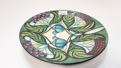 Lot 1120 - Moorcroft pottery circular charger decorated in the Blackwell by Nicola Slaney, dated 2008, 28cm diameter