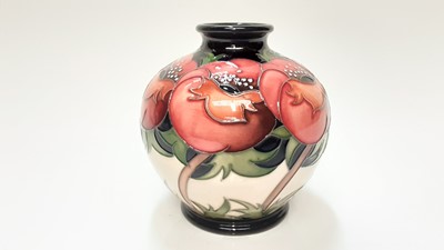 Lot 1127 - Moorcroft pottery vase decorated in the Meo Voto pattern by Rachel Bishop, dated 2013, 11cm high, boxed