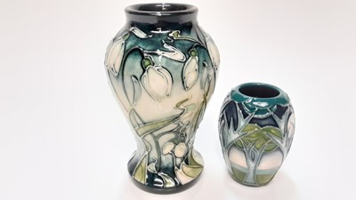 Lot 1129 - Moorcroft miniature pottery vase decorated in the Misty Moon pattern by Rachel Bishop together with Nivalis pattern vase, dated 2002 (2)