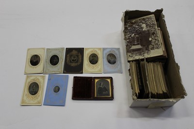 Lot 1427 - Early photographs including one cased Daguerreotype and some mounted tintypes plus a  lot of Victorian carte de visite photographs
