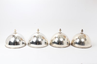 Lot 422 - Four silver plated plate covers