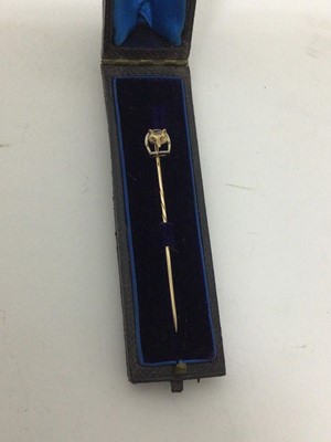 Lot 190 - Victorian gold and silver stock pin, fox and stirrup