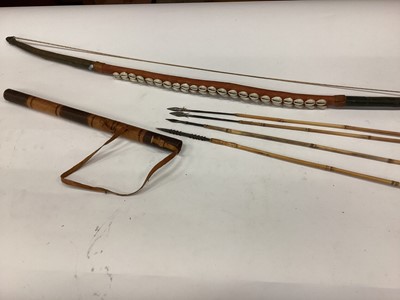 Lot 2699 - African hunting bow and arrows, given to the vendor in 1962 by a tribal cheif.