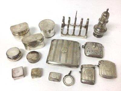 Lot 345 - Group of silver boxes to include vesta cases, pill boxes, trinket boxes, cigarette case, plus a silver toast rack and pepperette (15 items)