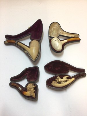 Lot 2405 - Four cased Meerschaum pipes, including one by Ludwig Hartmann & Eidam Wien, one of a confederate soldier, one of stallions, and another