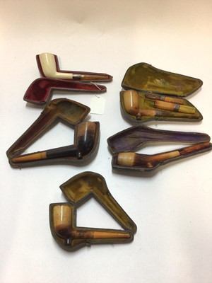 Lot 2408 - Five cased Meerschaum pipes, including one silver-banded and hallmarked Birmingham 1899, one with two cigar holders, hallmarked Birmingham 1900, etc
