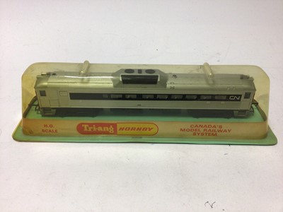 Lot 197 - Triang Hornsby HO gauge Canadian CN 101 passenger carriage No 3521, plus Hornsby OO gauge LMS red dining car 228 R4095A and Limo OO gauge Class SBB carriage No 309159, all boxed (3)