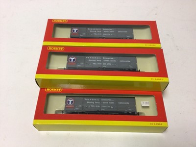Lot 248 - Hornby OO gauge rolling stock including Trainsrail VDA closed van (x5), R6138, EWS curtain sided wagon (x4), R6137, three other container wagons, Mainline Courtaulds plank wagons (x3), No. 37-151,...