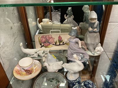 Lot 185 - Royal Worcester cabinet cup and saucer, together with a Moorcroft tray and Lladro and Nao figurines