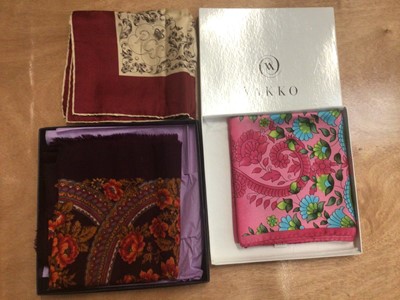 Lot 2109 - Box of silk scarves including boxed Vakko, evening wraps, other scarves plus a selection of unworn leather gloves.
