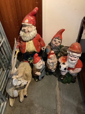 Lot 10 - Five garden gnome ornaments with one other
