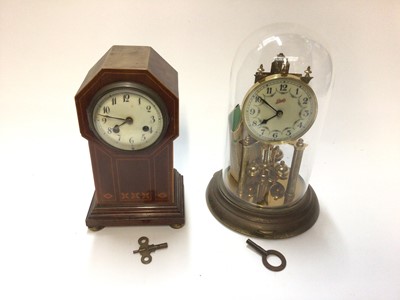 Lot 2504 - Edwardian inlaid mahogany mantel clock, and a Schatz clock under a glass dome (2)