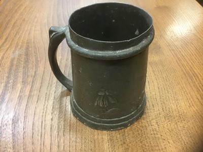 Lot 164 - Tudric art nouveau tankard, in the manner of Knox. Numbered 053