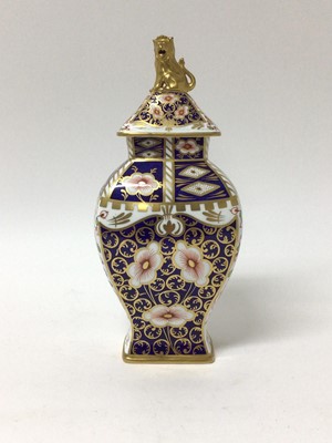 Lot 175 - Royal Crown Derby Imari vase and cover, of square baluster form, with lion knop, 25cm high