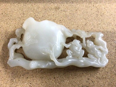 Lot 402 - Chinese jadeite brush washer, with lotus shaped bowl, tree and monkey carved decoration