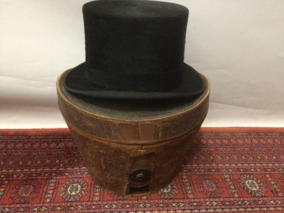 Lot 2105 - Black top hat by Tress & Co London in leather box