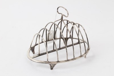 Lot 420 - George III silver toast rack
