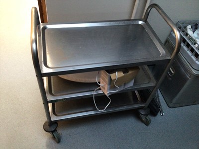 Lot 19 - A stainless steel three tier tea trolley, on castors, 700 mm x 380 mm
