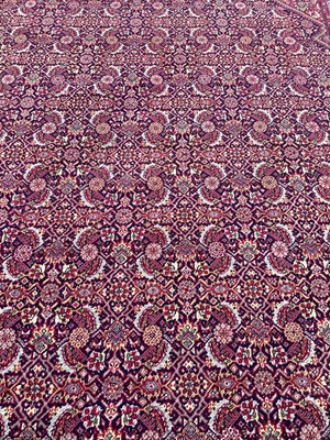 Lot 1400 - Large red and blue carpet, 370cm x 272cm