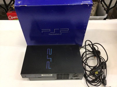 Lot 1824 - Play Station 2 console in original box with a selection of accessories and games