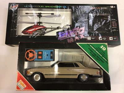 Lot 1828 - Corgi Truckertonic Convoy set, Grandstand Astro Wars, Palitoy Demon Driver, Air Attack launching helicopter GyroMax remote controlled, Optium remote control car all boxed