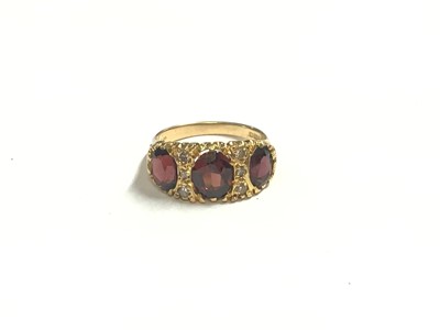 Lot 47 - Victorian style 18ct gold garnet and diamond ring