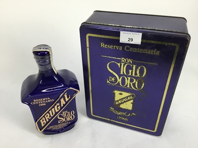 Lot 29 - One bottle, Ron Siglo De Soro, in ceramic bottle and original fitted tin box