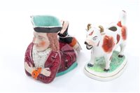 Lot 23 - Unusual Victorian Toby figure wearing a...