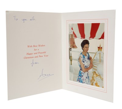 Lot 34 - H.R.H.Princess Anne, The Princess Royal, signed 1980s Christmas card with crowned A cipher to cover, delightful photograph of The Princess on board H.M.Y. Britannia to the inside, inscribed 'To you...