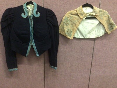 Lot 2088 - Victorian navy and blue wool jacket with pointed front and braid trim by Anatole Paris and a wool capelette with appliqued silk leaves and embroidery.