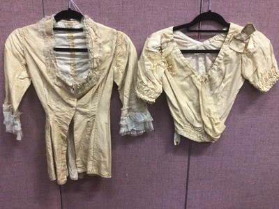 Lot 2089 - A selection of Victorian cream and black silk jackets and bodices.