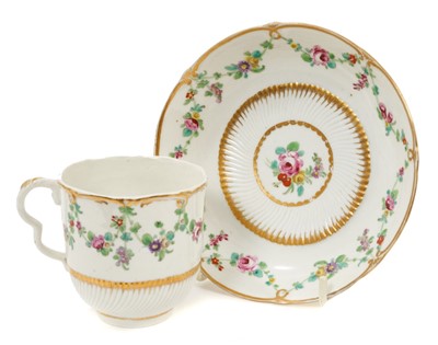 Lot 272 - A Bristol part spirally fluted coffee cup and saucer, circa 1775