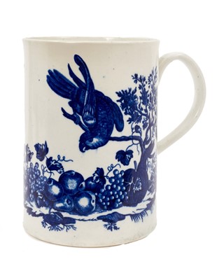 Lot 273 - A Worcester large blue printed Parrot Pecking Fruit pattern mug, circa 1772