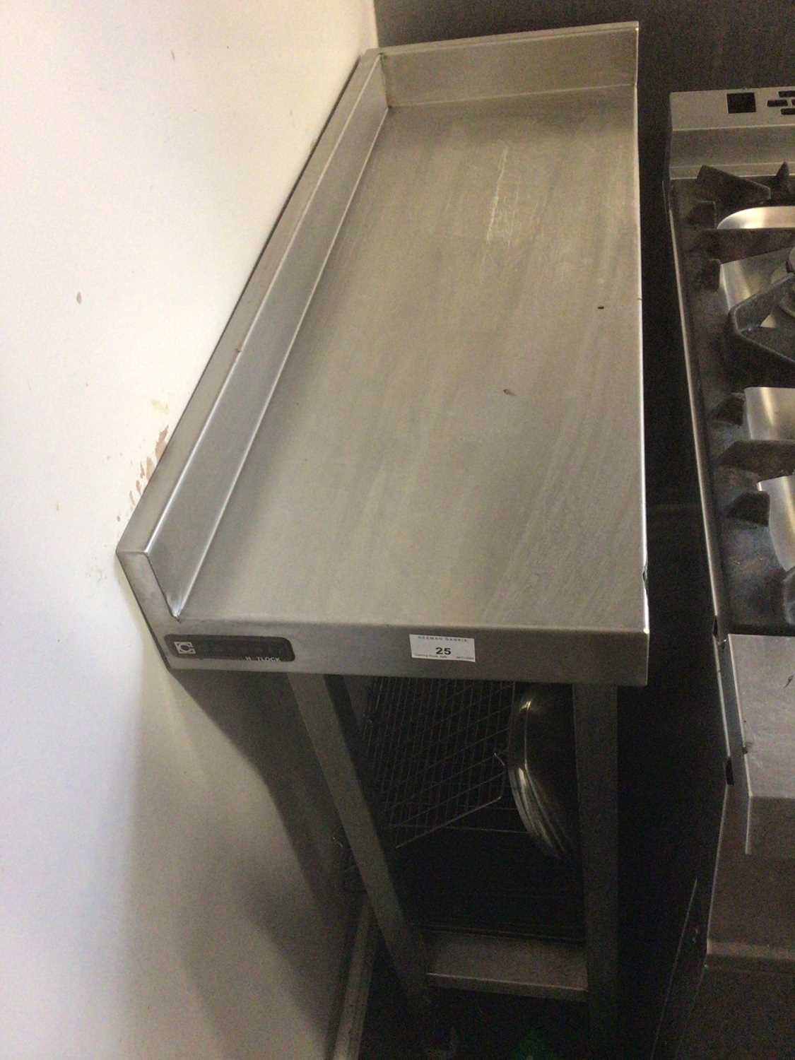 Lot 25 - A stainless steel corner preparation bench, with undershelf, 300 mm wide x 810 mm deep