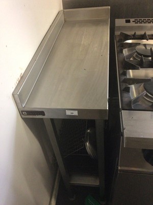 Lot 25 - A stainless steel corner preparation bench, with undershelf, 300 mm wide x 810 mm deep