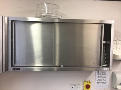 Lot 33 - A stainless steel double sliding door wall cabinet, 1200 mm wide x 340 mm deep