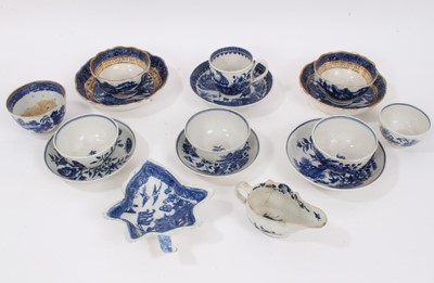 Lot 246 - A group of 18th century English blue and white porcelain, including a Lowestoft cream jug, Worcester and Caughley