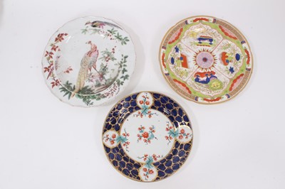 Lot 249 - An 18th century Chelsea plate, decorated with exotic birds, together with two Worcester plates (3)