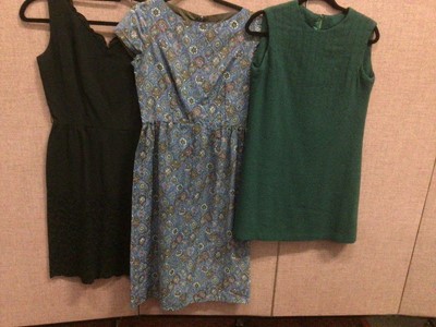 Lot 2096 - Group of 1950's/60's dresses and swing skirts including R & K Originals black shift dress with lace trim, short black crepe dress with cutout back and swing skirt,  green boucle wool short shift dr...