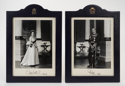 Lot 89 - H.M.Queen Elizabeth II and H.R.H.The Duke of Edinburgh, fine pair Signed presentation portrait photographs of the Royal couple taken at Buckingham Palace signed in ink on mount ' Elizabeth R 1969'...