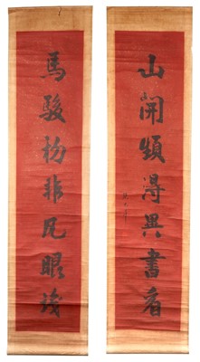 Lot 1024 - Pair of fine Chinese calligraphy couplets, on red splash paper, signed Zhang Daqian, approximately 150 x 38cm