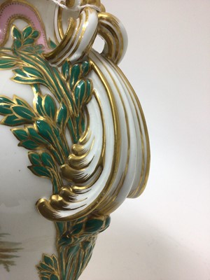 Lot 291 - A Minton Sevres-style vase and cover, circa 1850-70, polychrome decorated with flowers and exotic birds, on a green and pink ground with scrollwork handles, ermine mark to base, 32cm high