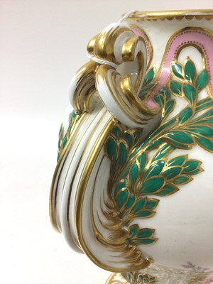 Lot 291 - A Minton Sevres-style vase and cover, circa 1850-70, polychrome decorated with flowers and exotic birds, on a green and pink ground with scrollwork handles, ermine mark to base, 32cm high