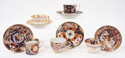 Lot 315 - Five early 19th century Coalport cups and saucers, with Imari-type patterns