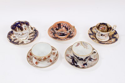 Lot 319 - Five early 19th century Coalport cups and saucers, including Imari style