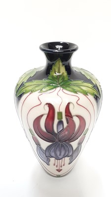 Lot 1132 - Moorcroft pottery vase decorated in the Fuchsia Cascade pattern, numbered edition 32 for The Moorcroft Collectors Club, by Rachel Bishop, dated 2013, 16cm high, boxed