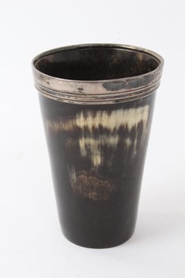 Lot 537 - Victorian horn beaker of tapered form with silver rim engraved 'Nelson Ellis', (London 1873), maker T. J, 9.2cm in height.